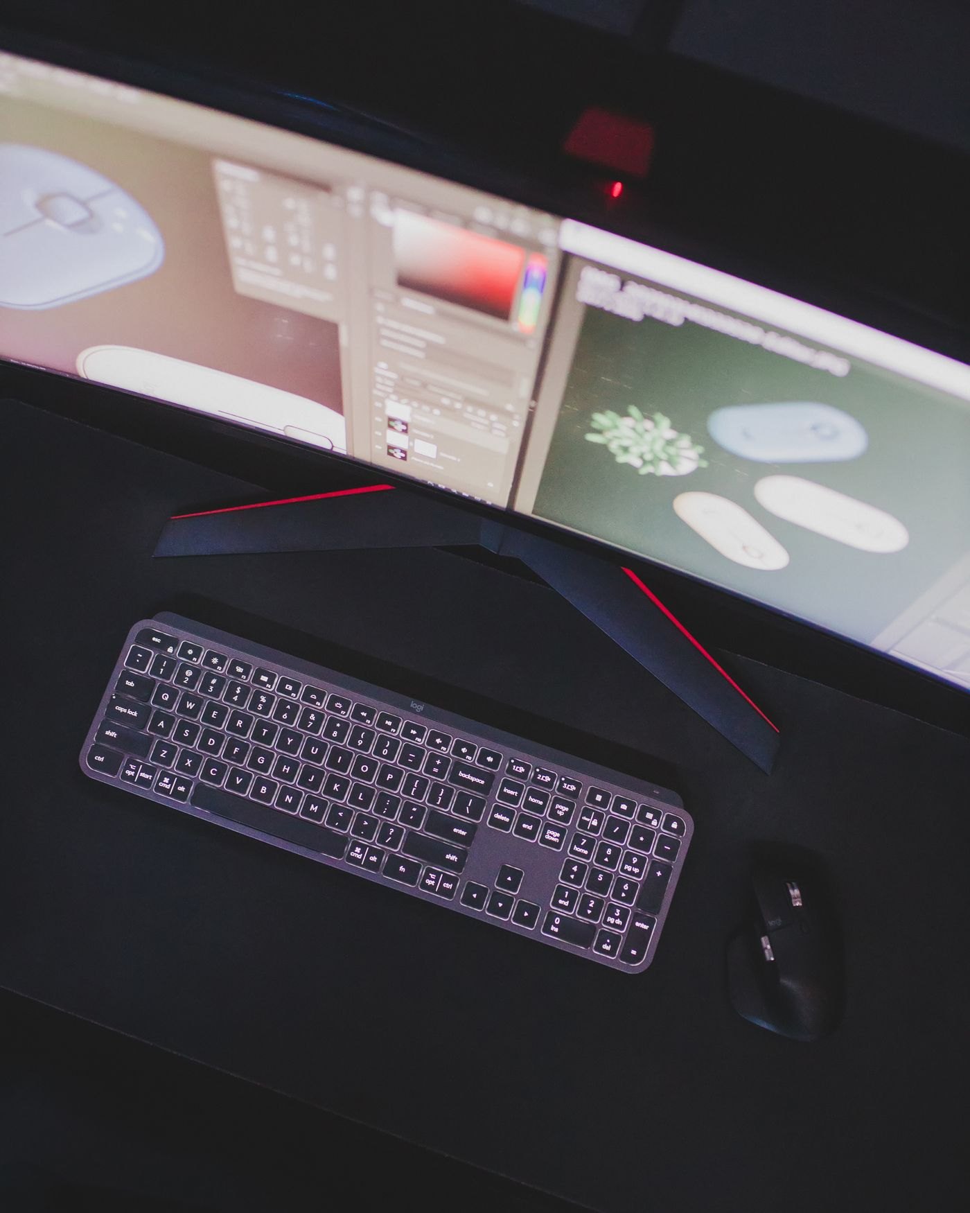 Desk mat beneath a keyboard and mouse