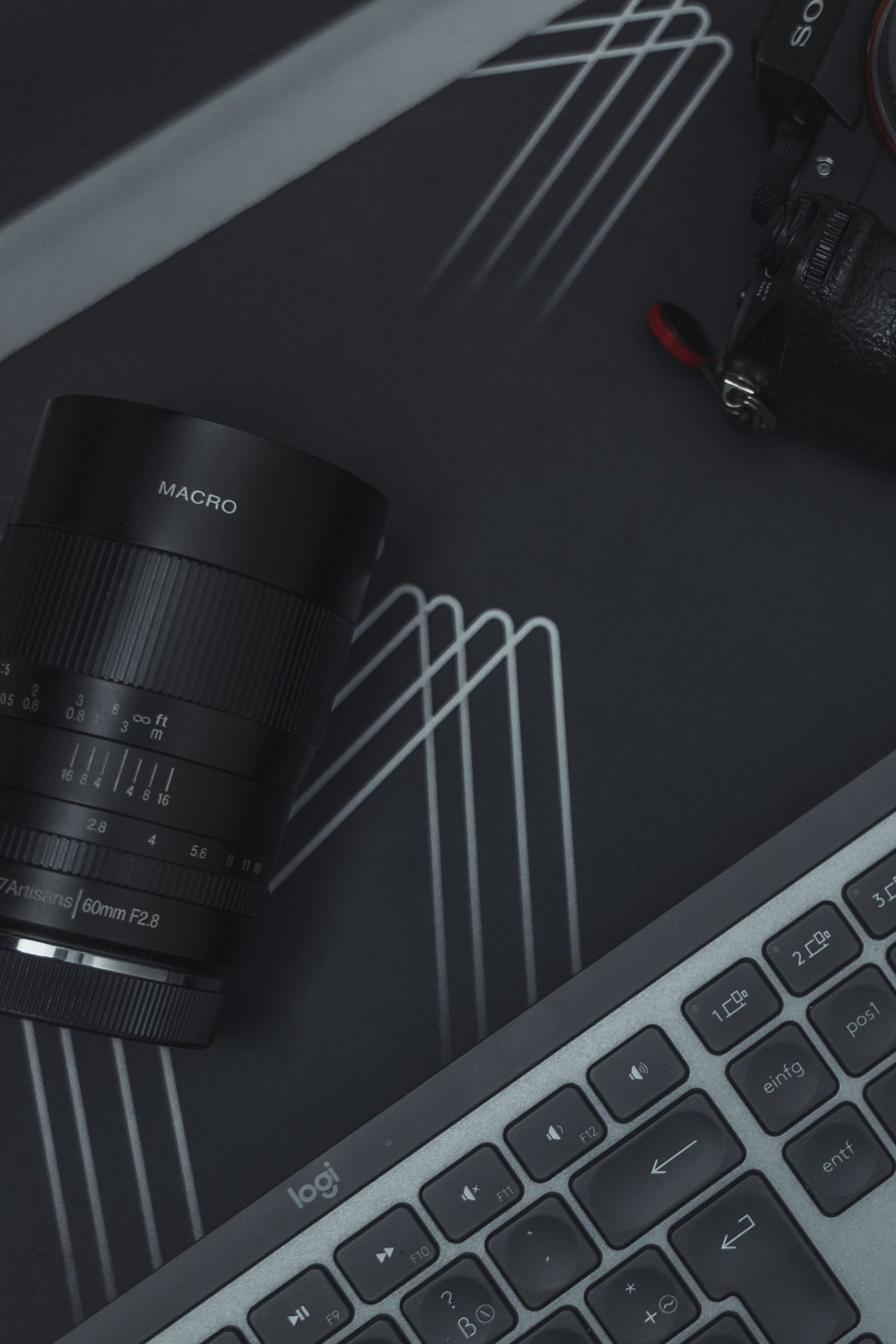 Camera lens and keyboard viewed from above